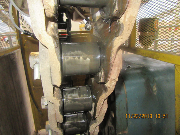 Coating of drive chain on sand dryer